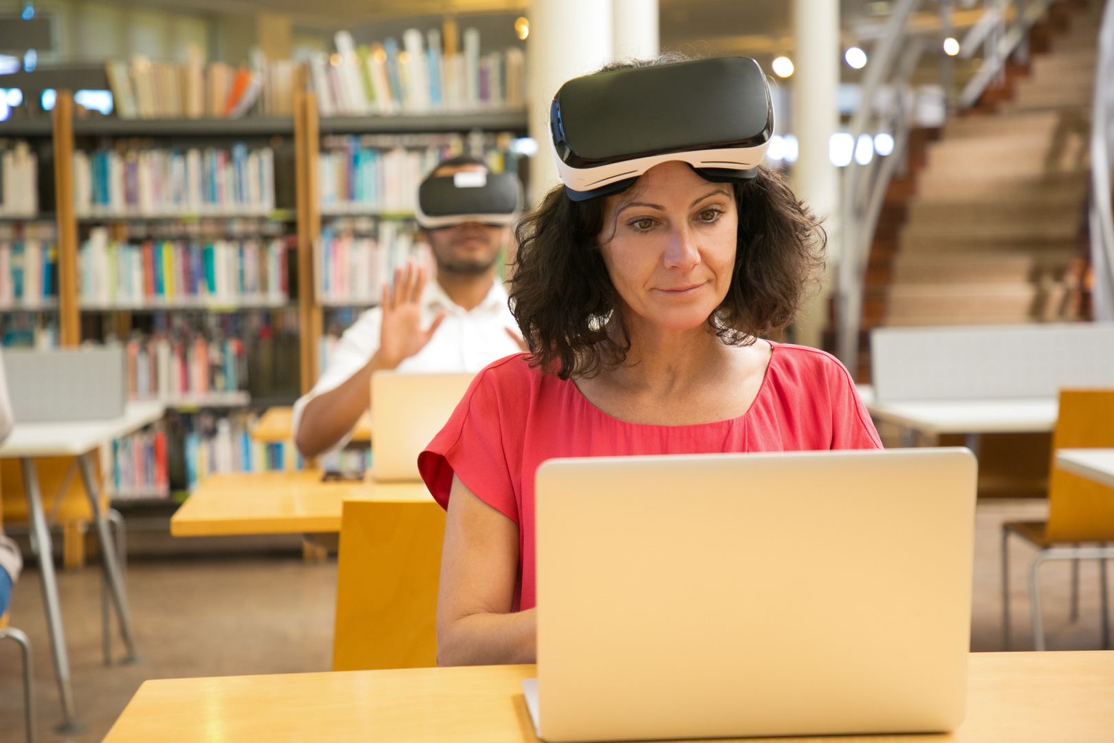 front-view-cheerful-caucasian-woman-setting-vr-headset